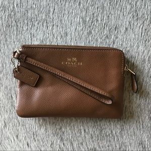 Brown leather Coach wristlet